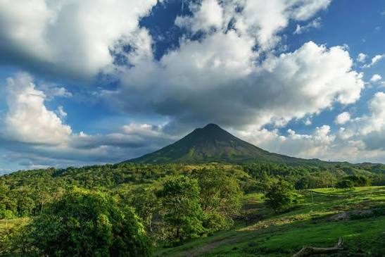 Volcano above rainforest
